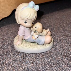 Precious Moments figurine titled "No Bones About It - You're Grrreat".